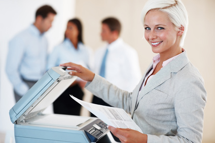 Happy customer using photocopier